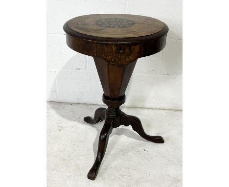 A Victorian inlaid mahogany sewing table on tripod base 