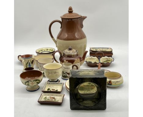 A collection of ceramics, mostly Torquay Ware including candlestick holder, butter dish, lot also includes a vintage glass as