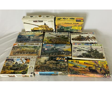 A collection of eleven boxed military tanks plastic construction kits including Tamiya King Tiger German Army Heavy Tank, Mon