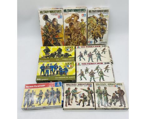 A collection of ten vintage boxed Military Miniatures plastic model kits including Tamiya Russian Army Assault Infantry, U.S 