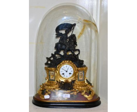 A French gilt metal and porcelain mounted mantel clock 