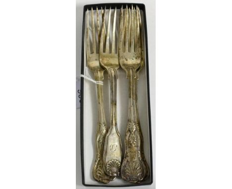 Three silver Kings pattern table forks, Sheffield, 1898, and a fiddle thread and shell pattern table fork, London, 180612.6oz