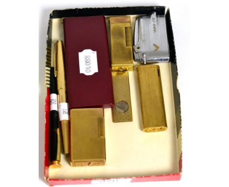 A 9ct gold cigar cutter; a Dupont lighter; three further lighters; a Dunhill pipe tamper; Parker fountain pen
