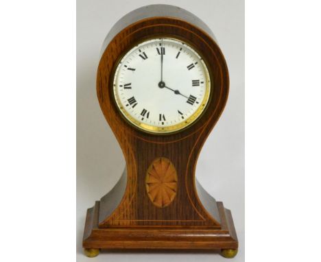 An inlaid balloon shaped mantel timepiece 