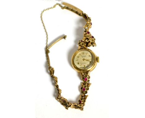 A lady's 9ct gold Rotary wristwatch, bracelet set with small rubies 