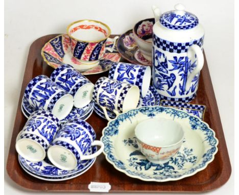 A first period Worcester blue and white bowl together with a tea bowl; two 19th century cups and saucers; and a Coalport coff