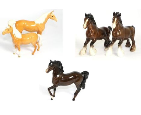 Beswick Horses Comprising: Cantering Shire, model No. 975, brown gloss; another; Arab ''Xayal'', model No. 1265, palomino glo