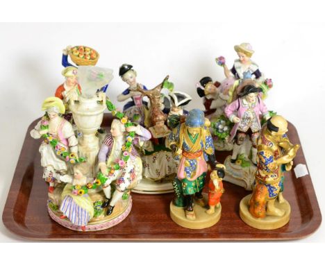 Seven Continental ceramic figures and two Japanese figures (9) 