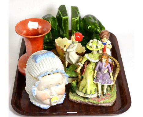 Two Royal Worcester figures ''Saturday's Child Works Hard For A Living'', ''Thursdays Child Has Far To Go'', green coloured b