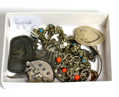 A Norwegian antelope brooch, a Norwegian feather brooch, an enamel brooch, a silver craft Noah's Arc brooch, an eastern craft