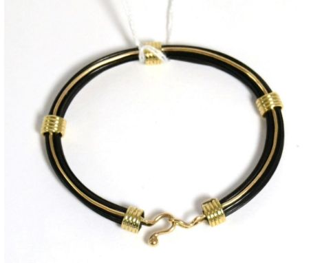 An elephant hair bangle, with mounts stamped '9C'