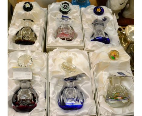 A group of six cased Caithness perfume bottles and stoppers