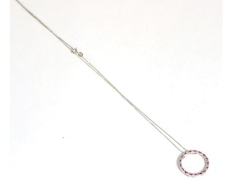 A 9ct white gold ruby and diamond pendant 