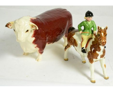 Beswick Girl on Pony, model No. 1499, skewbald gloss and a Hereford Bull, model No. 1363A, brown and white gloss (2)Girl - So