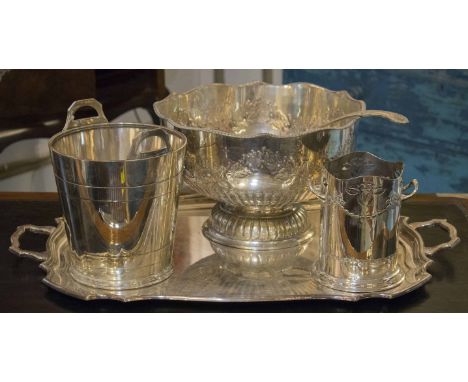 PUNCH BOWL, Georgian design hand chased silver plate with lion handles and kings pattern ladle together with a plated bottle 