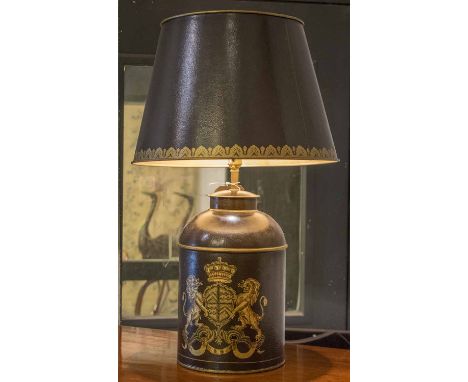 TOLEWARE TABLE LAMP, with central coat of arms decoration and a shade, 71cm H.