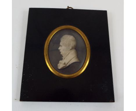 An oval bust portrait miniature, of a gentleman, en grisaille, 6 x 5 cm