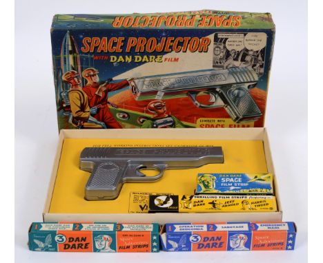 A Merit Projector with Dan Dare film, with additional films, all boxed, and having original bill of sale 