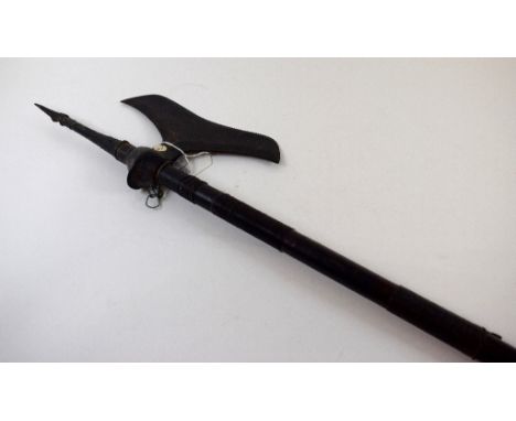 An axe, probably 19th century, 99 cm long