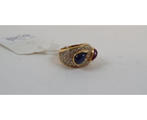 An 18ct gold, cabochon sapphire and ruby ring, set diamonds, approx. ring size L   Condition report Report by NGApprox. 12.0 