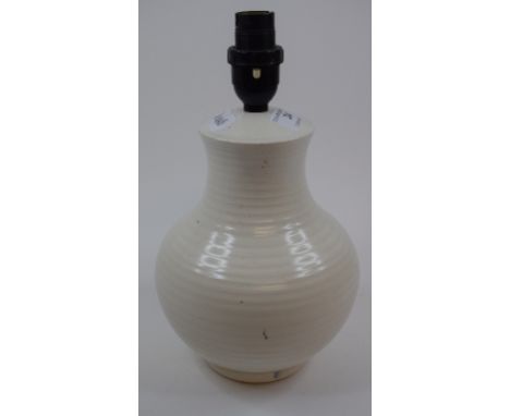 A Moorcroft pottery white glazed lamp, 20 cm high (excluding fitting)
