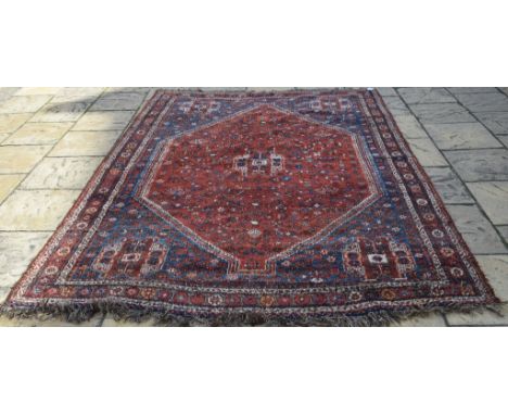 A Persian Qashqai carpet, 284 x 209 cm