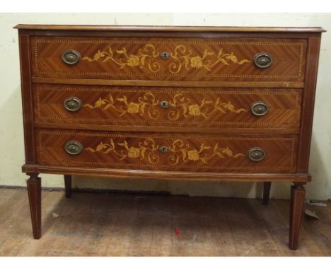 An inlaid mahogany bow front chest, of three long drawers, 108 cm wide, a matching dressing table, and a matching three door 