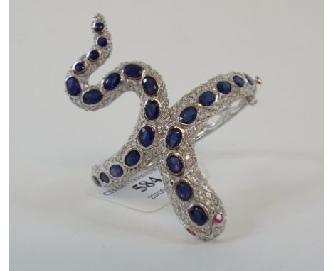 A silver snake bangle