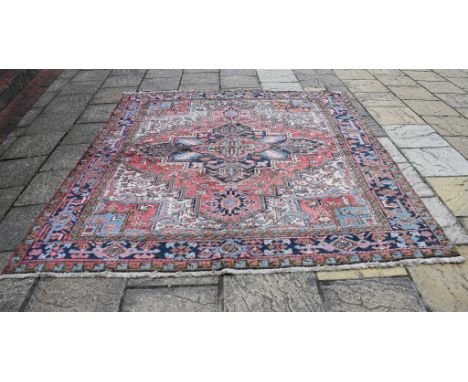 A Persian Heriz carpet, 271 x 237 cm 