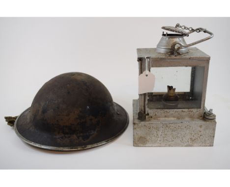 A Southern Railways Welch Patent Lamp Manufacturing & Railway Supplies Lamp, 25 cm high, a WWII Warden helmet, toys, ceramics