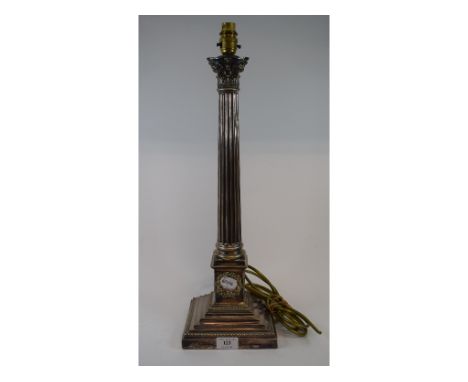 A late Victorian silver plated Corinthian column table lamp, on a stepped square base (adapted for electricity), 56 cm high (