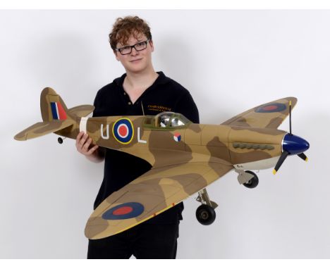 A large scale model of a WWII Supermarine Spitfire, fitted an airscrew master engine, 5' 3 inch wing span  See illustration