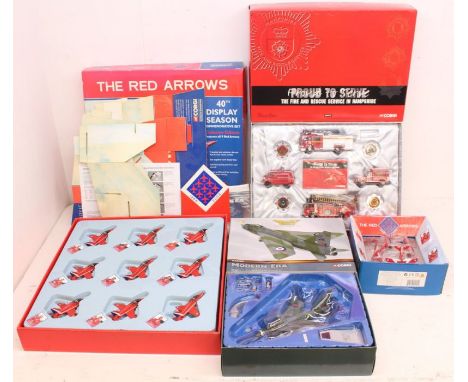 Corgi: A collection of four boxed Corgi items to comprise: Red Arrows CSFS11009, and CSFS07004; Proud to Serve CC99152; and T