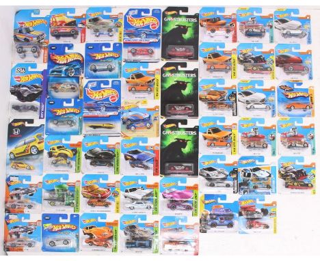 Hot Wheels: A collection of assorted Hot Wheels carded vehicles to include: HW Workshop, Drop Tops, 1998 First Editions, Art 