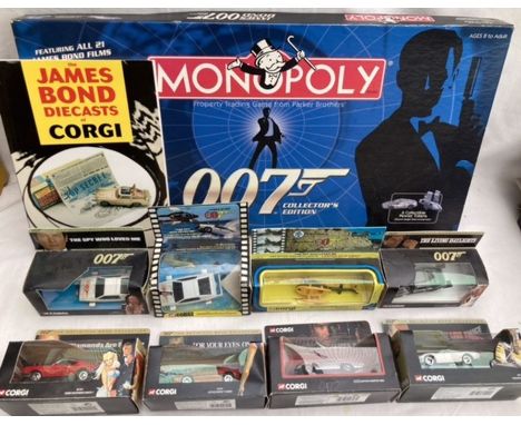 James Bond: A boxed James Bond 007 Monopoly Game, 2006 containing pewter playing pieces. Along with eight Corgi Junior model 