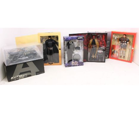 Collectables: A collection of four sealed large-scale figures to comprise: Ignite Roman Empire; Sideshow Hellboy; DC Direct B