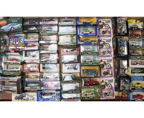 Diecast: A collection of assorted boxed Corgi diecast vehicles together with four Minichamps Valentino Rossi figures, Matchbo