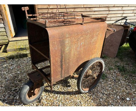 MILK HAND CART by Turners of London, 3 wheeled on rubber pneumatic tricycle tyres, with bottle holder to top and has remnants