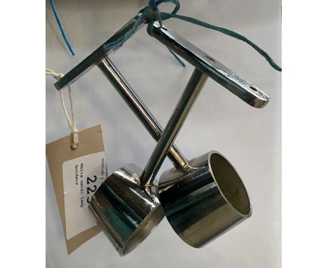 White metal lamp holders. This lot carries VAT.
