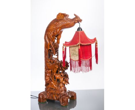 CHINESE WOODEN LAMP
carved as a dragon, with shade, 52cm high
