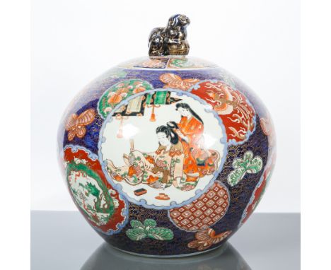 LARGE JAPANESE IMARI VASE AND COVER
of rounded form, with foe dog finial, 40cm high