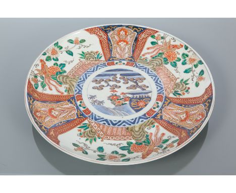 LATE 19TH CENTURY JAPANESE IMARI CIRCULAR WALL PLAQUE
the centre decorated with stylised plant and foliage, within a reserved