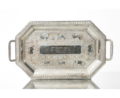 CEYLONESE WHITE METAL SERVING TRAY
embossed and chased with geometric borders and scrolling panels with animal figures, engra