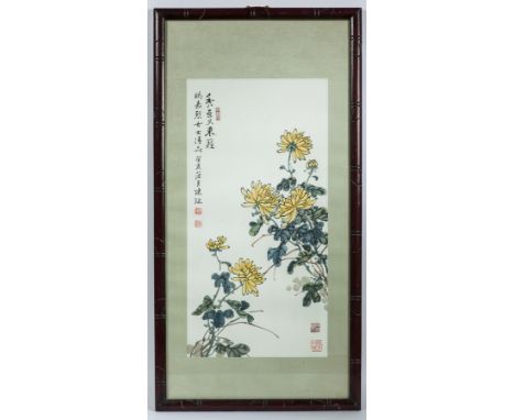 CHINESE PAINTING
depicting yellow flowers, on paper, signed and seal stamped, in a wooden bamboo effect frame, 88.5cm x 45.5c