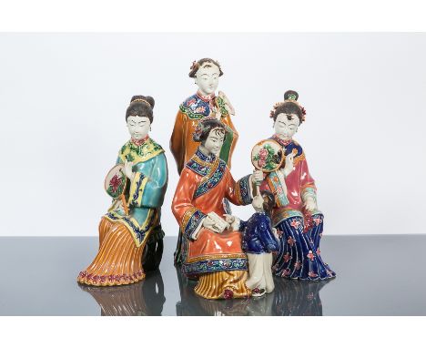 FOUR 20TH CENTURY CHINESE FIGURES
of females, the tallest 30cm high (4)
