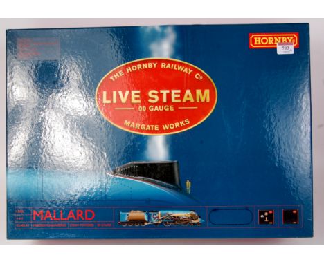 A Hornby live steam 00 gauge 'Mallard' engine and tender, appears unused (NM-BNM), together with container of distilled water