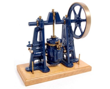 An un-usual compressed air or gas fired single cylinder scratch built vertical steam engine, comprising of central raised osc