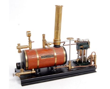 Maxwell Hemmens, Selby marine engine with twin cylinders above crankshaft with marine brass flywheel, pump to wood clad boile