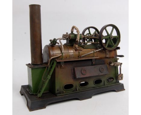 DOLL Germany, a modified classic tinplate large steam engine c.1920 with twin over type cylinders, twin overhung flywheel on 