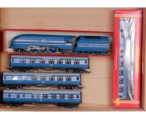 A Hornby streamlined LMS blue Coronation engine and tender together with 4 matching coaches, one boxed (G)
